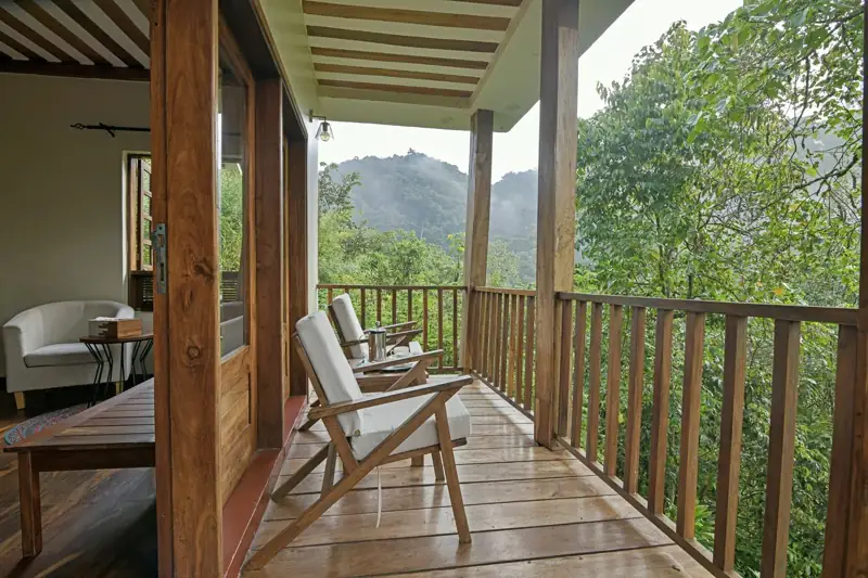 Private cottage veranda overlooking Bwindi forest at Four Gorillas Lodge, Rushaga
