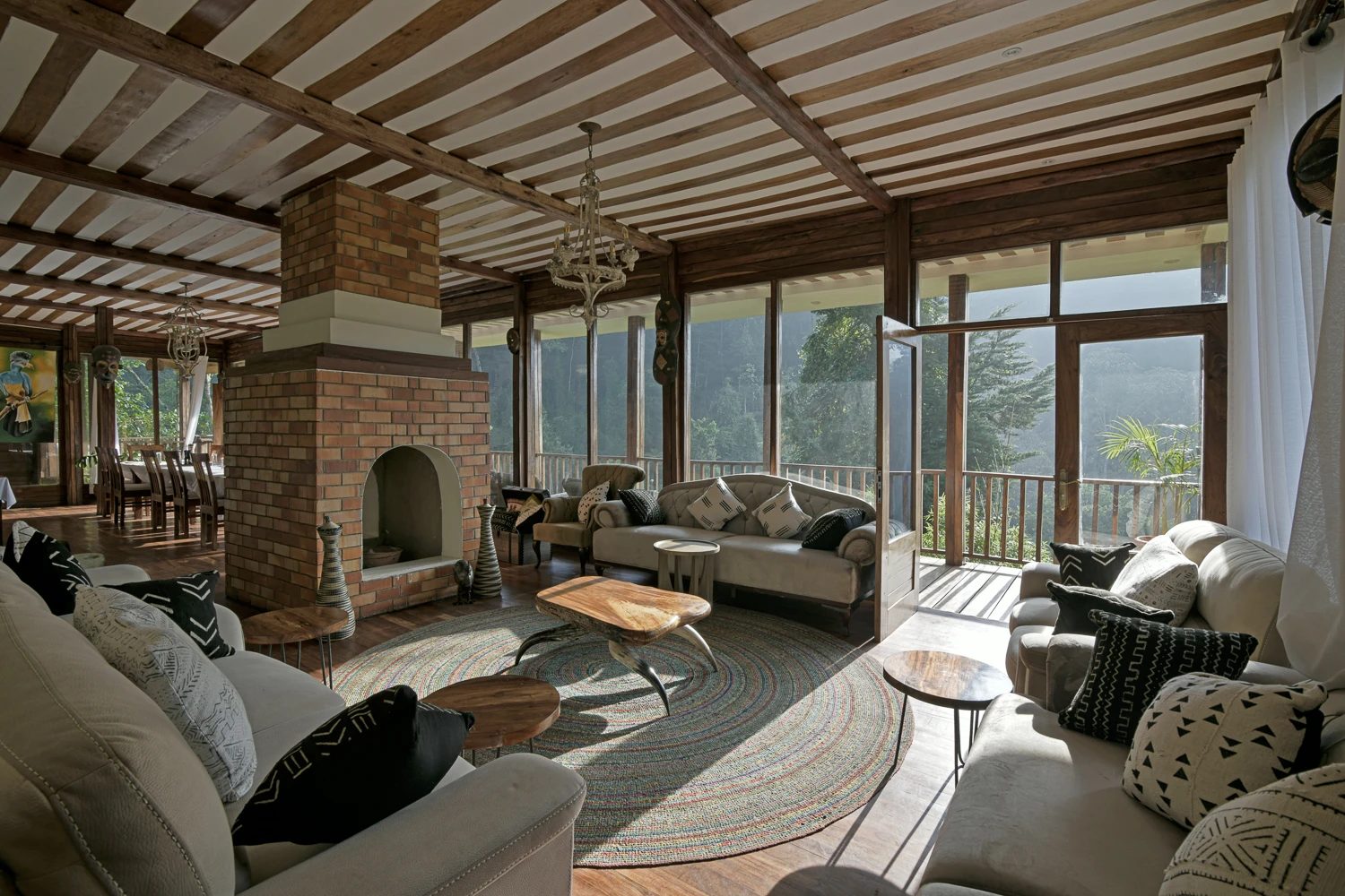 Main lounge and fireplace at Four Gorillas Lodge, Rushaga