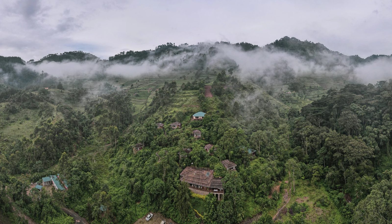 Aerial view of Four Gorillas Lodge in the misty hills of Rushaga, Bwindi
