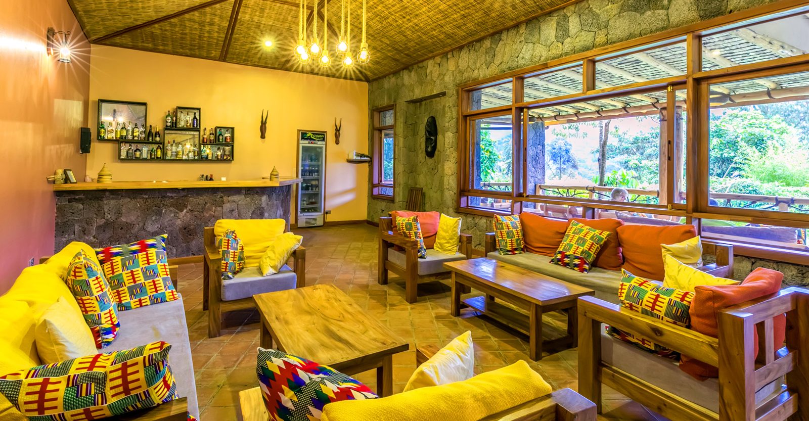 Lounge with colourful seating at Ichumbi Gorilla Lodge